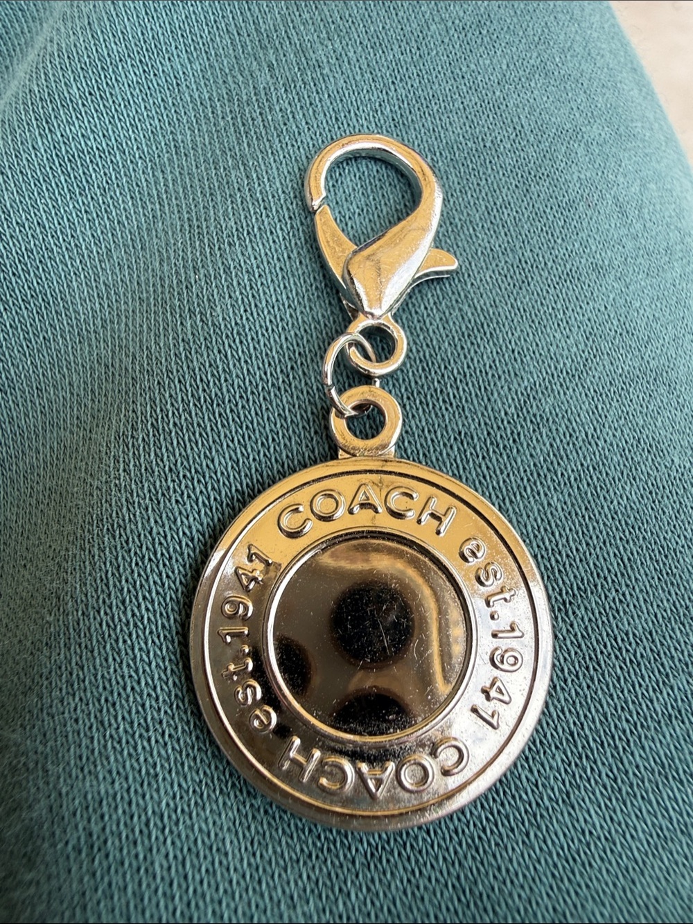 Coach Silver-Tone Round Logo Clip Charm